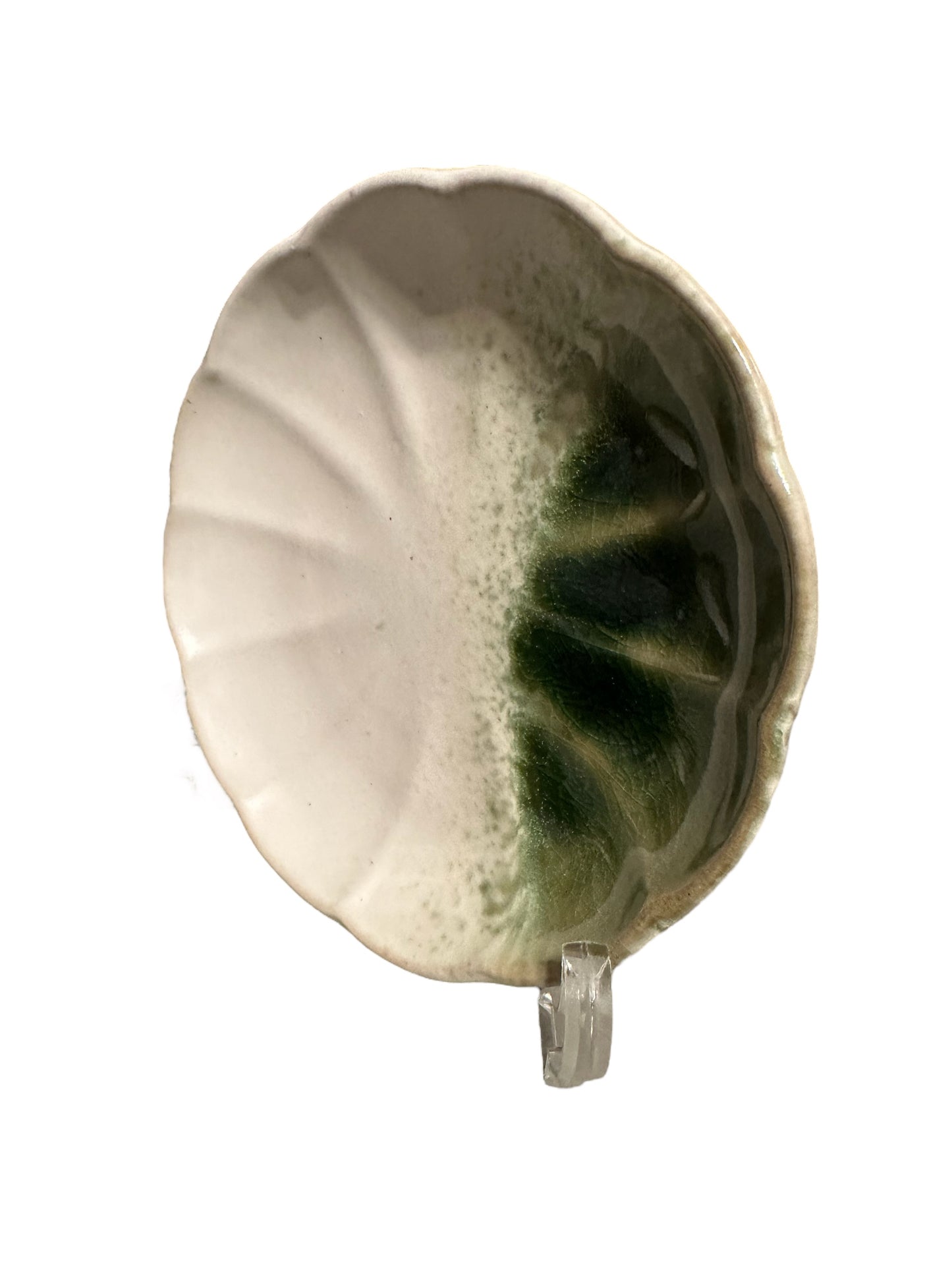 Round green grazed on white saucer Size 5.5" x 1" height