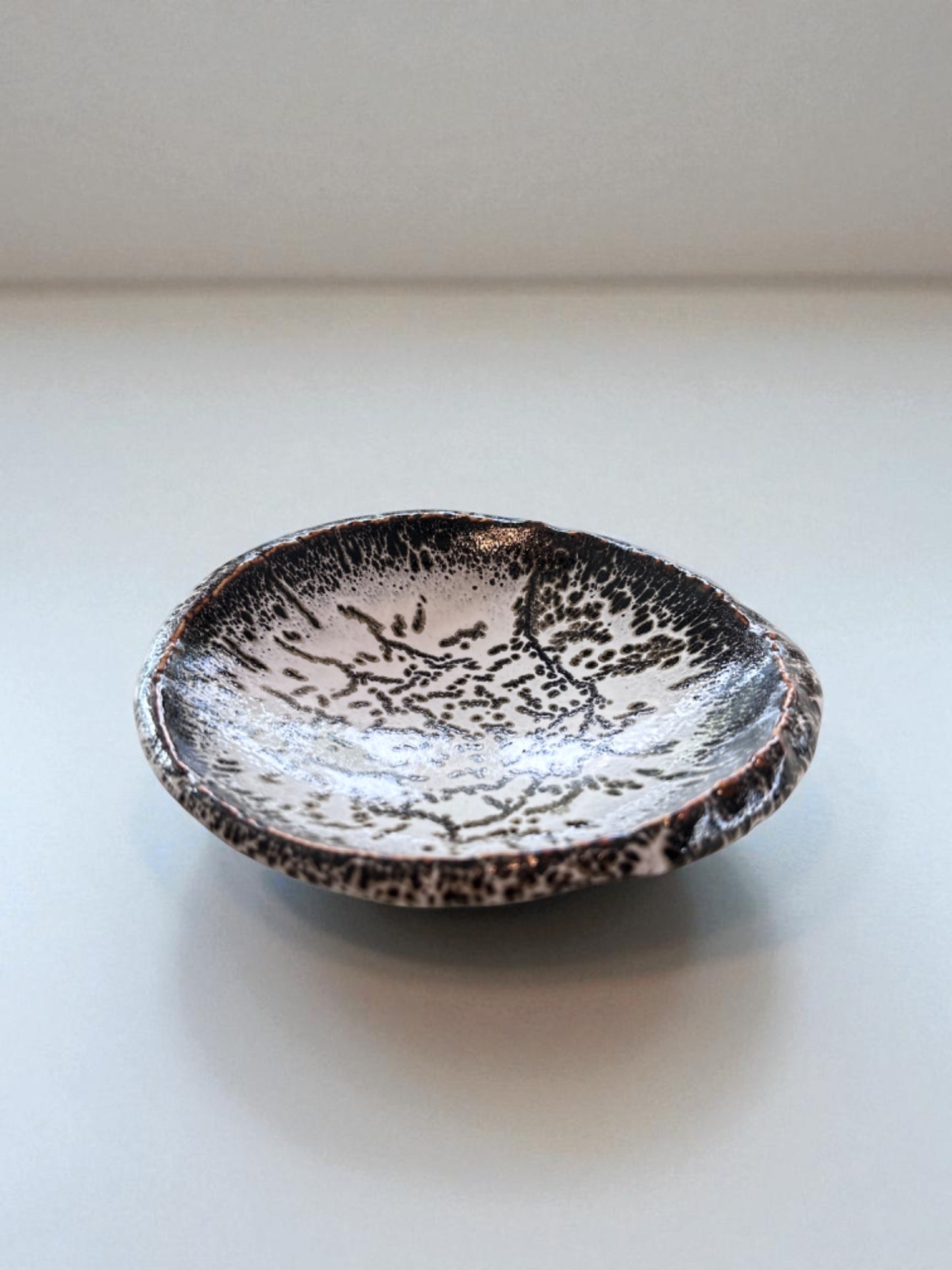 Handcrafted Japanese Stoneware Saucer – Black & White Speckled Glaze
