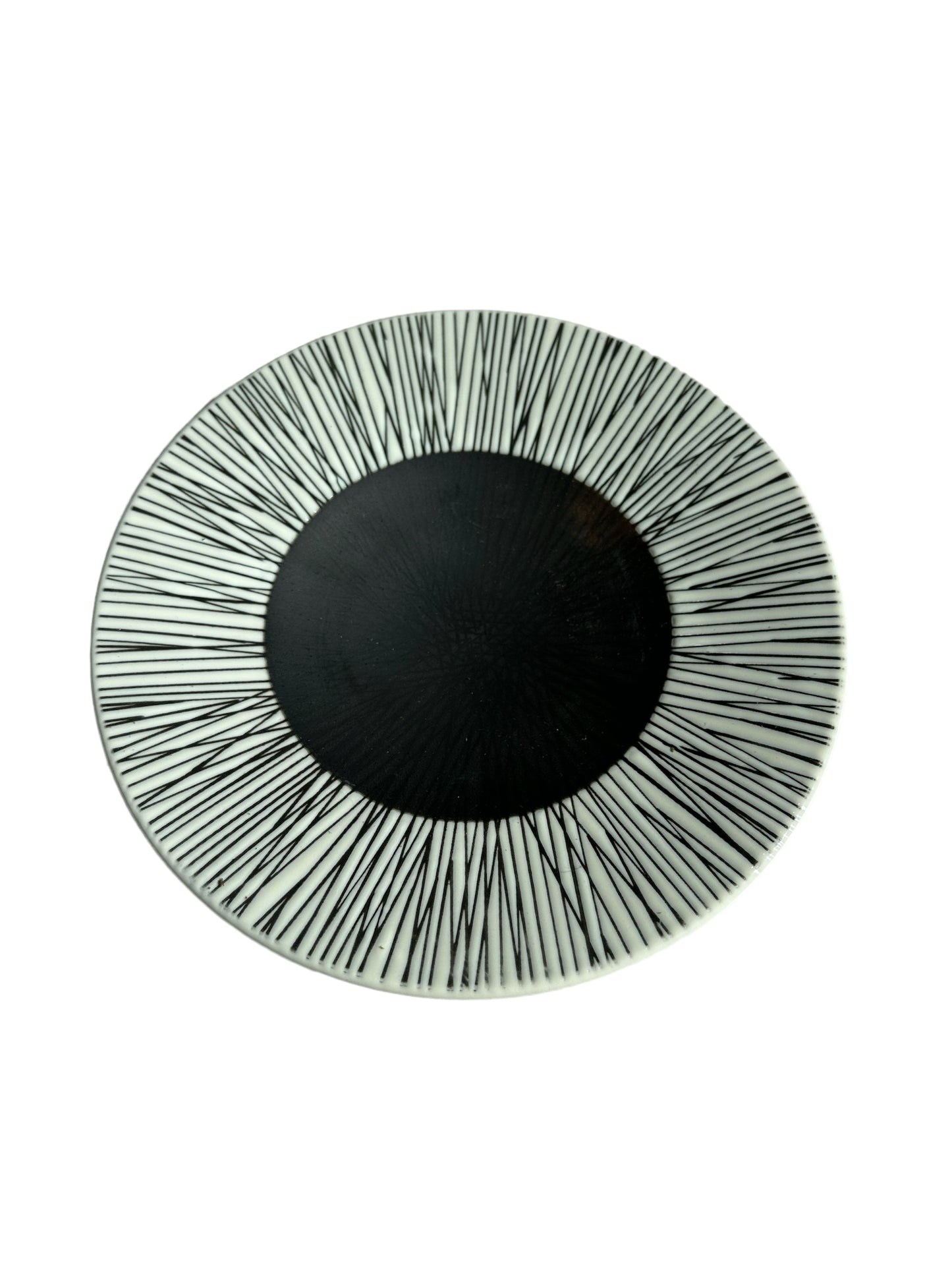 Radial pattern of black lines on 8" decorative plates