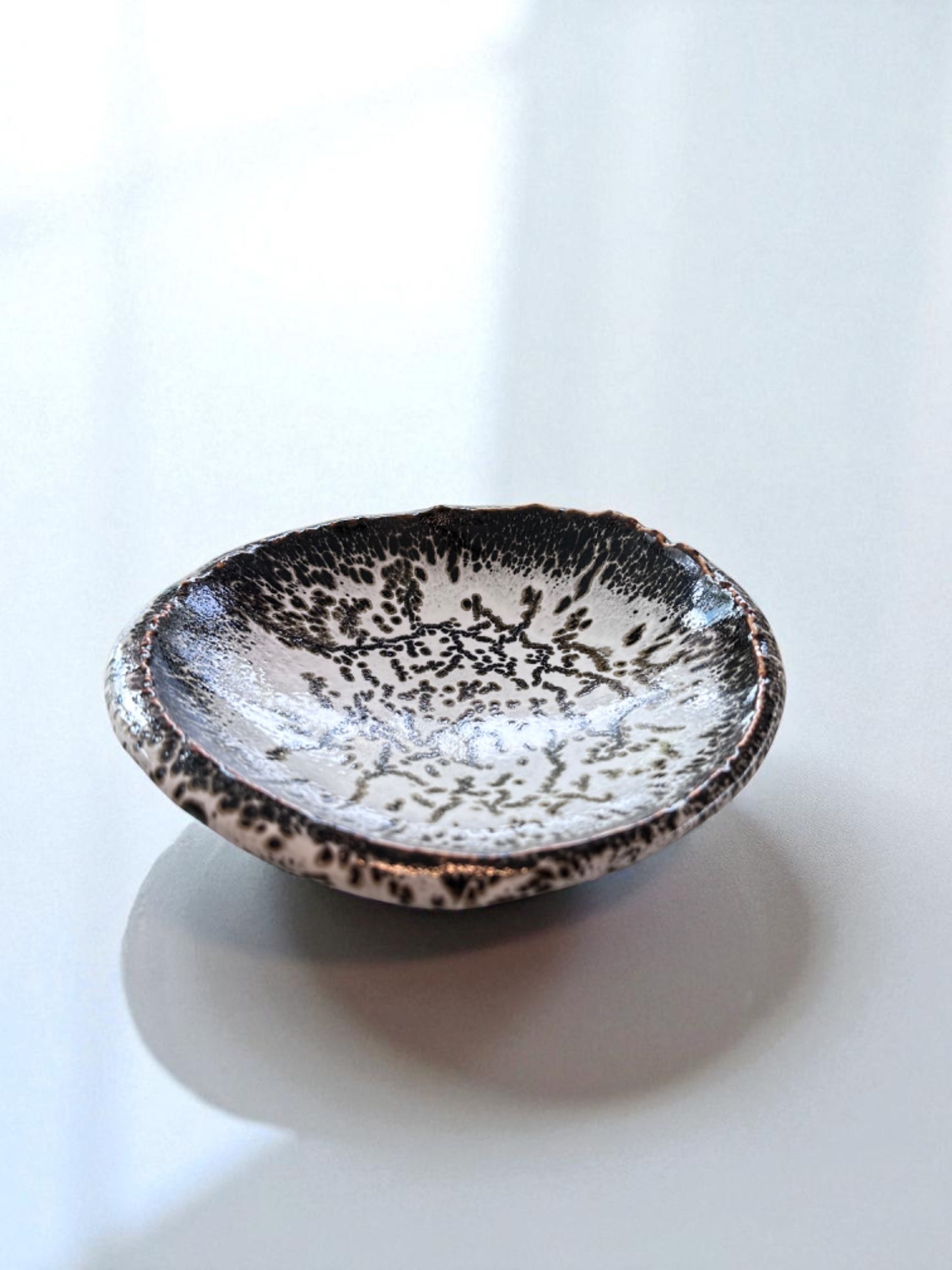 Handcrafted Japanese Stoneware Saucer – Black & White Speckled Glaze